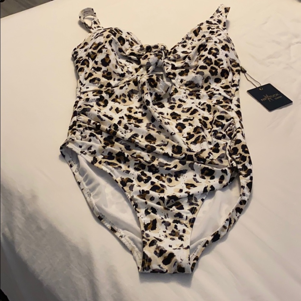 Nip tuck bathing suit size 12 brand new with tags.